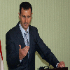  Syria's Assad: Little chance peace talks would succeed 