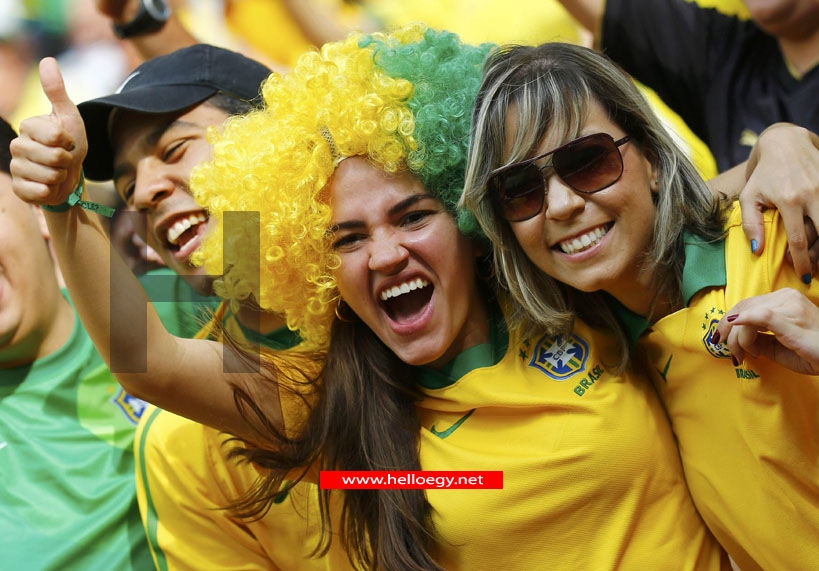 Soccer-Brazil beat Japan but protests spoil opening day
