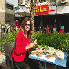 Cairo: HelloEgy. The passers-by in the streets of Cairo were surprised by the Lebanese singer Pascale Machalani sitting at a table in the open air eating the popular Egyptian food in a famous restaurant.Pascal posted her image on social networkings, in which she eats the beans and fal